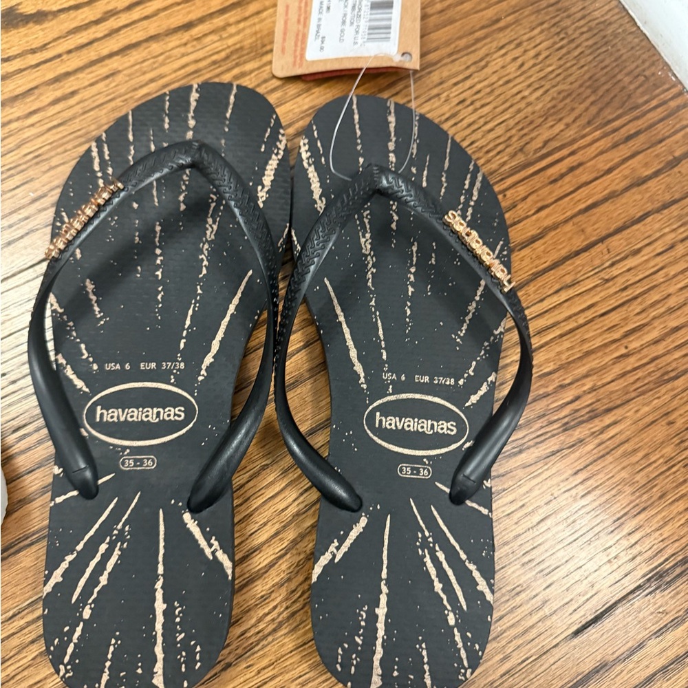 Havaianas Black Sandals with Gold Accent Logo